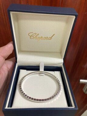 Chopard Silver Faceted Bangle in Navy Presentation Box